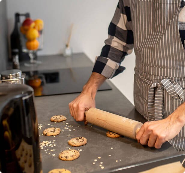 Man making cookies wearing an apron